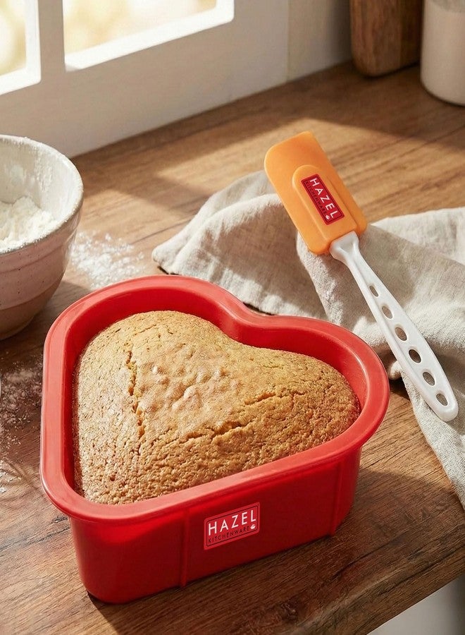 هايزل قالب كيك صغير من السيليكون على شكل قلب أحمر من هازل، مناسب لنصف كيلوغرام، مع ملعقة برتقالية. - Image 5